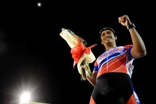 Malaysia's Azizul Awang celebrates after winning the men's 200m time trial