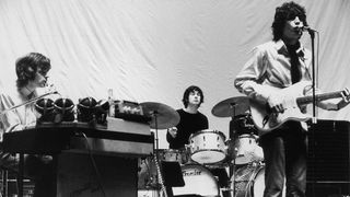 British psychedelic rock group Pink Floyd during rehearsals for the group's show 'Games for May' at the Queen Elizabeth Hall in London, 12th May 1967. The show featured an early experiment with quadrophonic sound. Left to right: Rick Wright, Nick Mason and Syd Barrett.