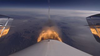 This photo of Virgin Galactic's SpaceShipTwo in flight shows the view aft as the private space plane made its third supersonic rocket-powered test flight on Jan. 10, 2014