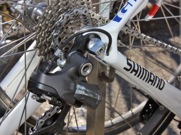 The rear derailleur wire on the Rabobank Giants exits right at the end of the chain stay.