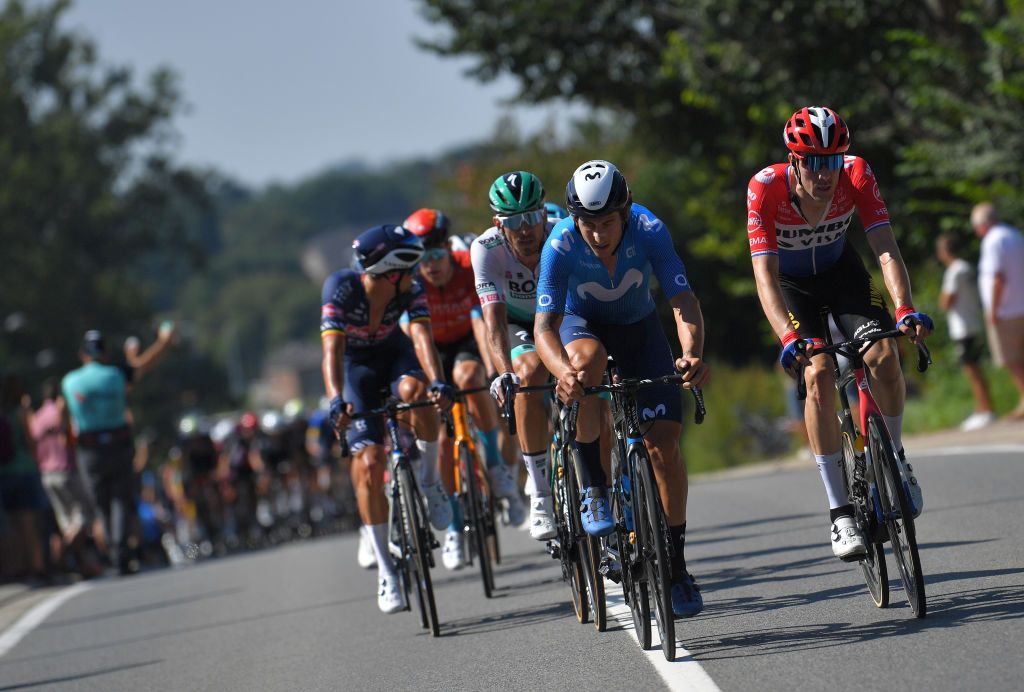BILZEN BELGIUM SEPTEMBER 03 LR Ivan Garcia Cortina of Spain and Movistar Team and Mike Teunissen of Netherlands and Team Jumbo Visma compete during the 17th Benelux Tour 2021 Stage 5 a 188km stage from Riemst to Bilzen BeneluxTour on September 03 2021 in Bilzen Belgium Photo by Luc ClaessenGetty Images