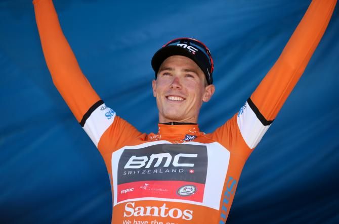 Dennis Rohan (BMC) raises his arms in the ochre jersey