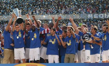 Members of the United States celebrate winning the Gold Cup after defeating Panama in Chicago on Sunday.
