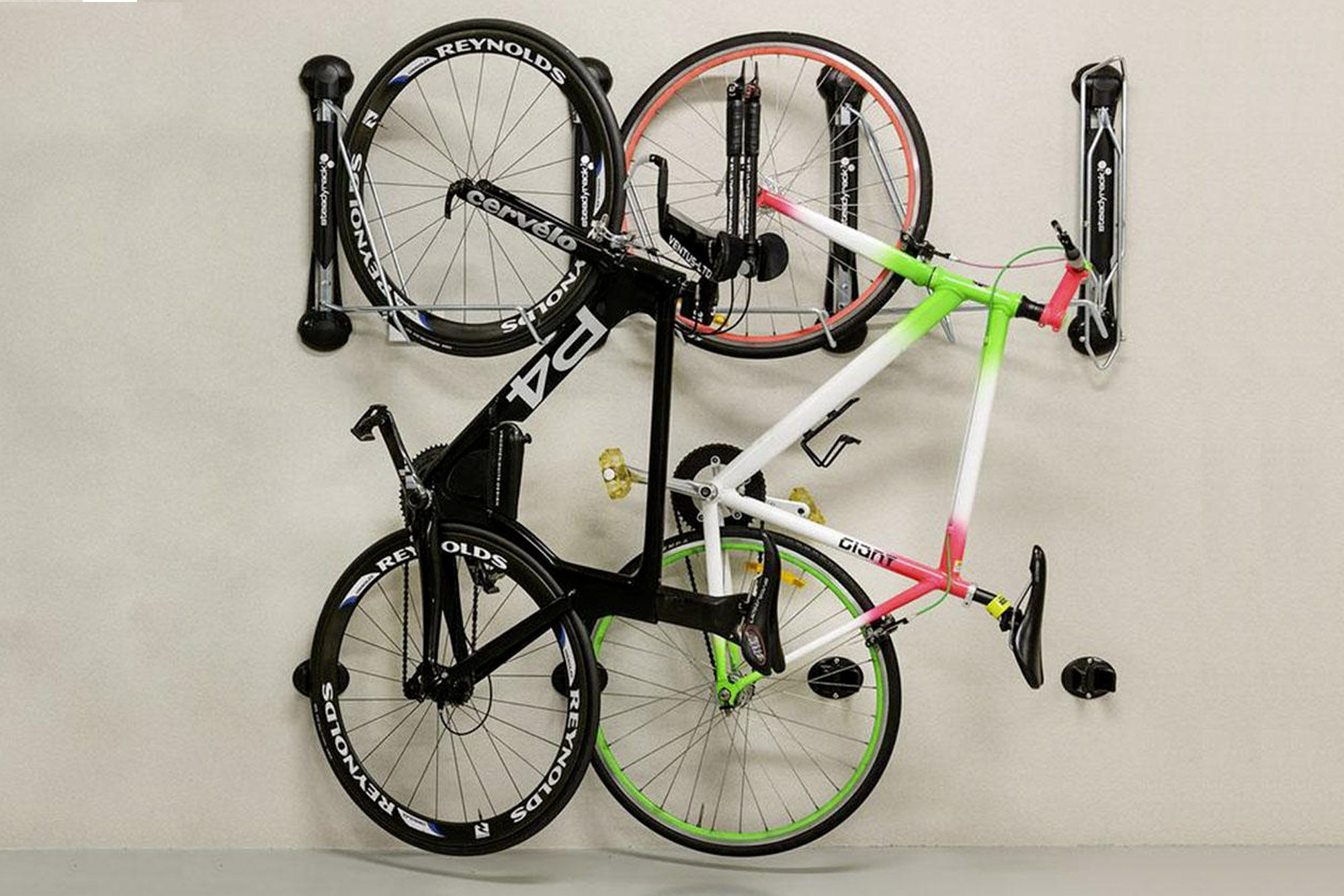 Two road bikes pushed to the side and parallel to the wall thanks to the steadyracks ability to pivot