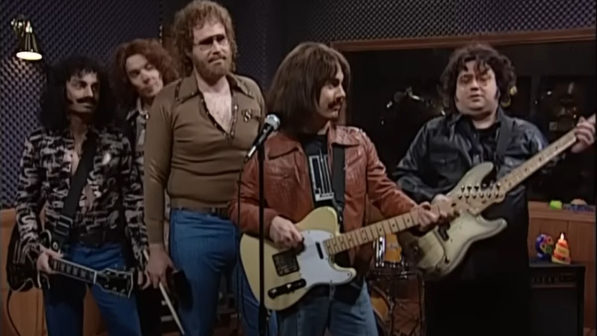 From left to right: Chris Kattan holding a guitar, Jimmy Fallon, Will Ferrell holding his cowbell, Chris Parnell holding a guitar and Horatio Sanz holding a guitar. 