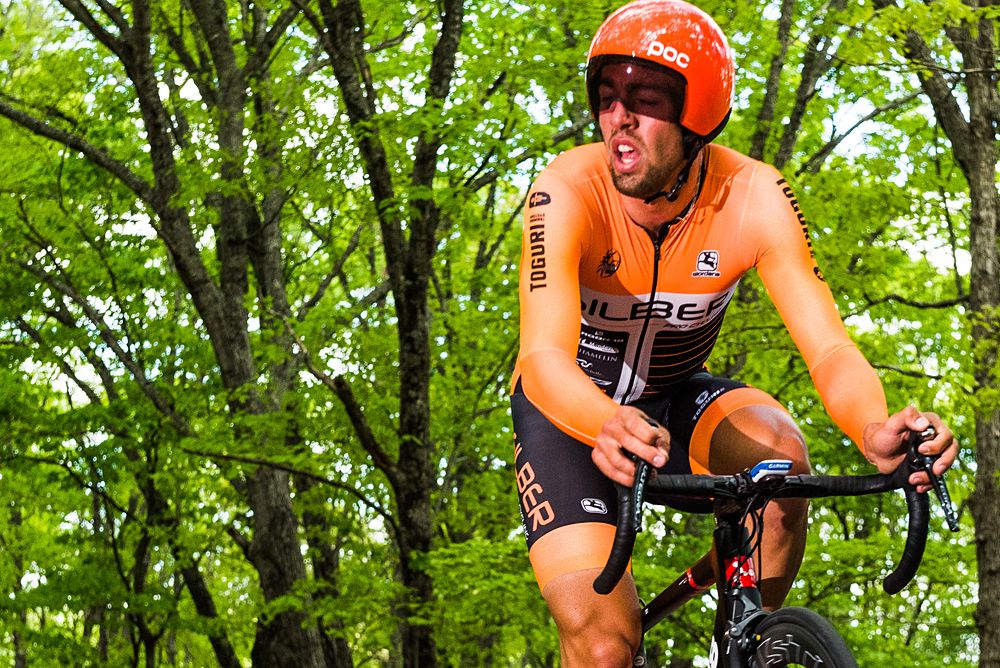 A Silber Pro Cycling (Canada) rider looks up the road as he makes his way up the switchback section of the course.