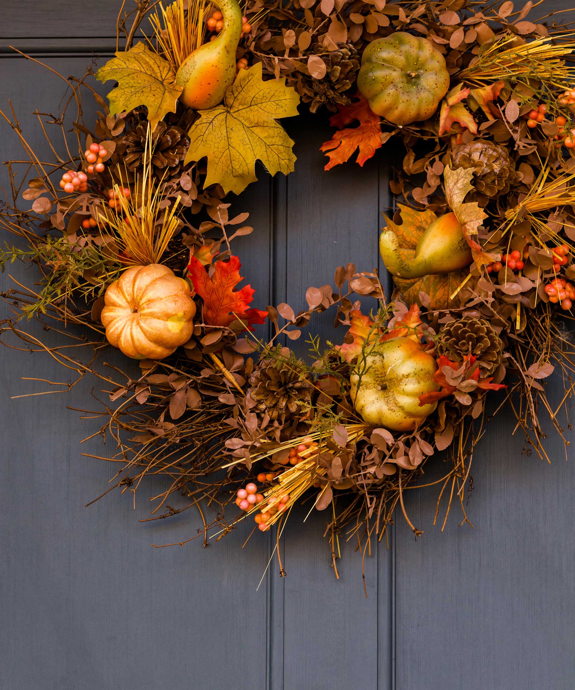 autumnal halloween wreath with pumpkins