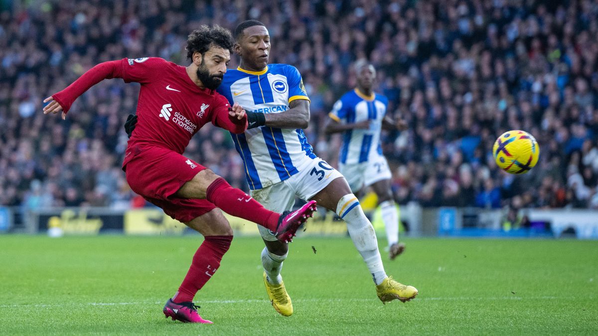 Mohamed Salah of Liverpool FC and Pervis Estupiñan of Brighton &amp; Hove Albion in action during ahead of the big FA Cup fourth round match between Brighton vs Liverpool at the Amex Stadium on 29th January, 2023.