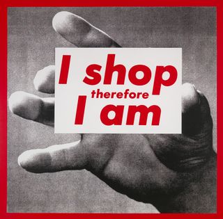 A hand embraces the slogan ‘I shop therefore I am’ in an artwork by Barbara Kruger