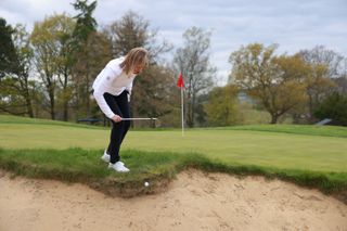 ball plugged in face of bunker