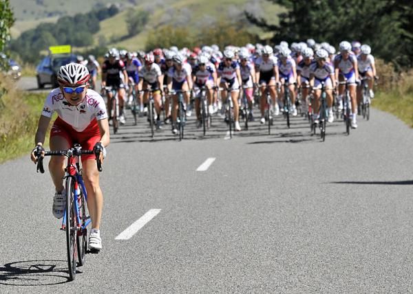 A Chinese rider tries to bring the peloton to life.