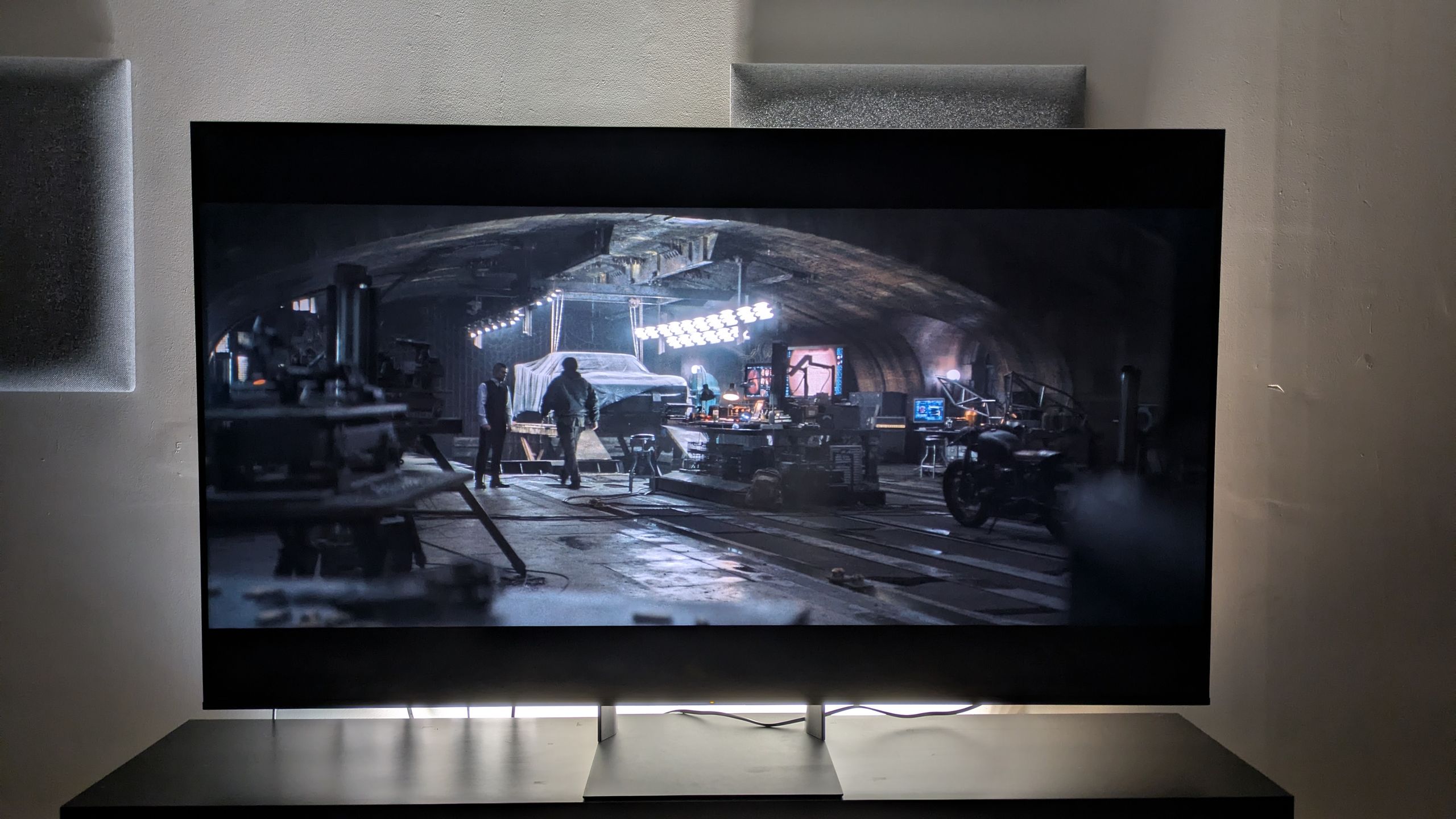 Sony Bravia 7 II with a shot of the batcave from The Batman on screen. The Bravia 7 II shows excellent contrast between light and dark tones