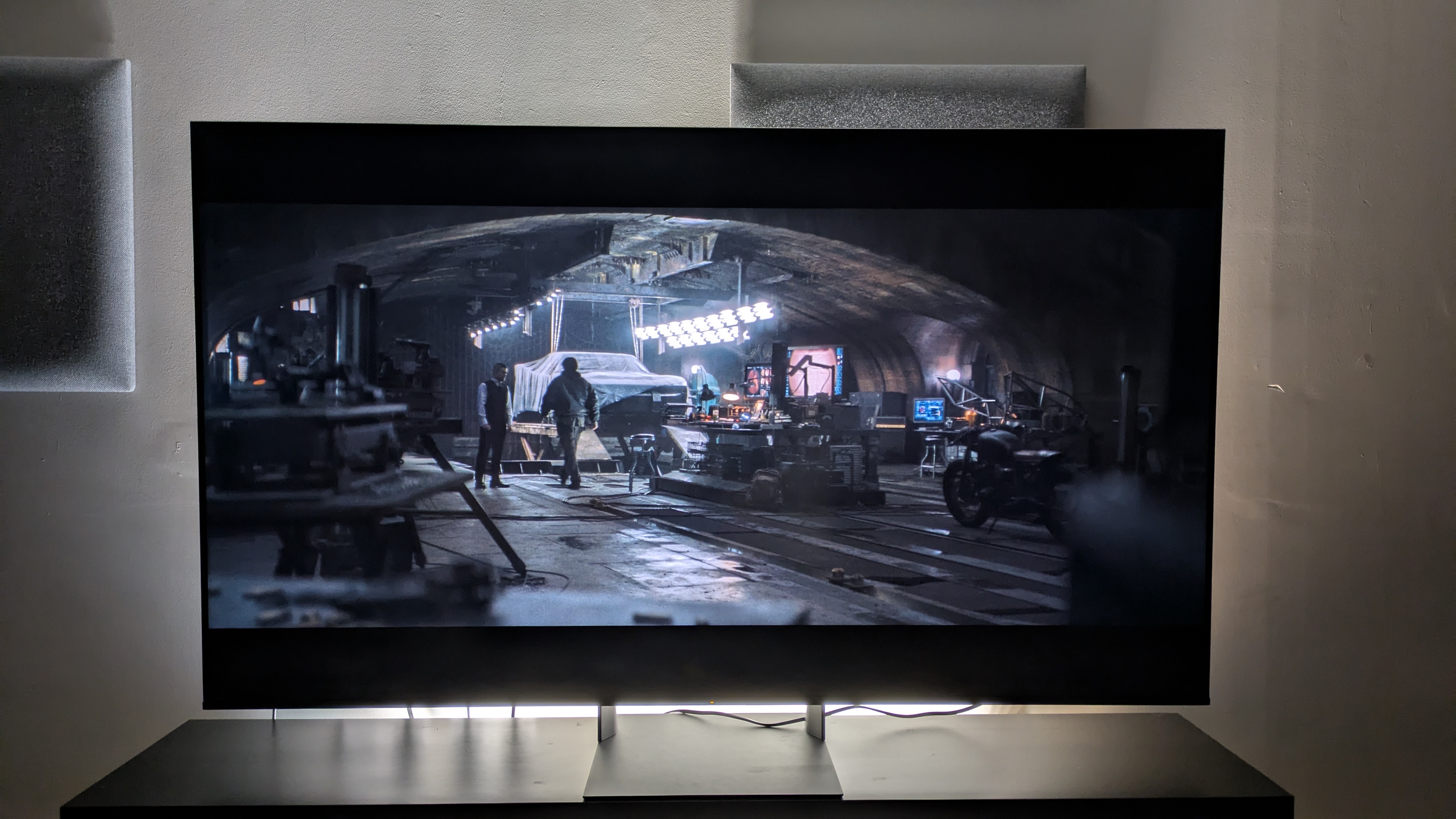 Sony Bravia 7 II with a shot of the batcave from The Batman on screen. The Bravia 7 II shows excellent contrast between light and dark tones