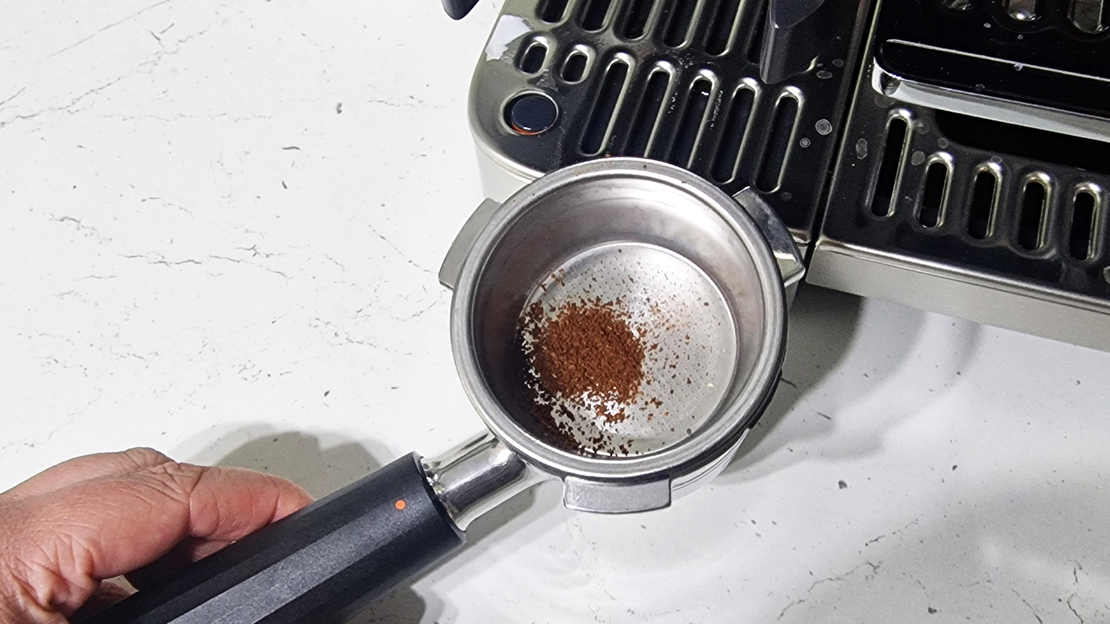 Ninja Luxe Café Pro being tested in a green and white kitchen