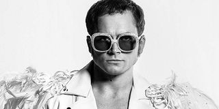 Rocketman Taron Egerton as Elton John, looking serious against a white background