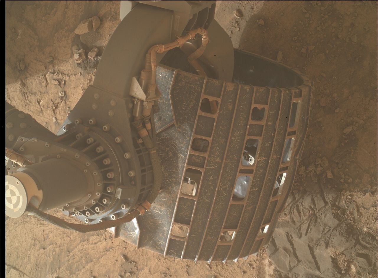 A wheel of the Mars Curiosity rover showing damage from rugged terrain