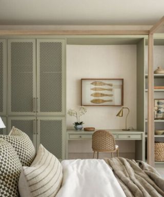 Rattan wardrobe with cream bed and nautical themed decor