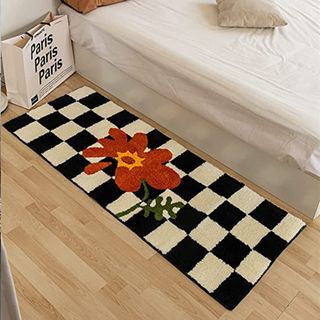 Black and White Checkerboard Rug with red flower motif