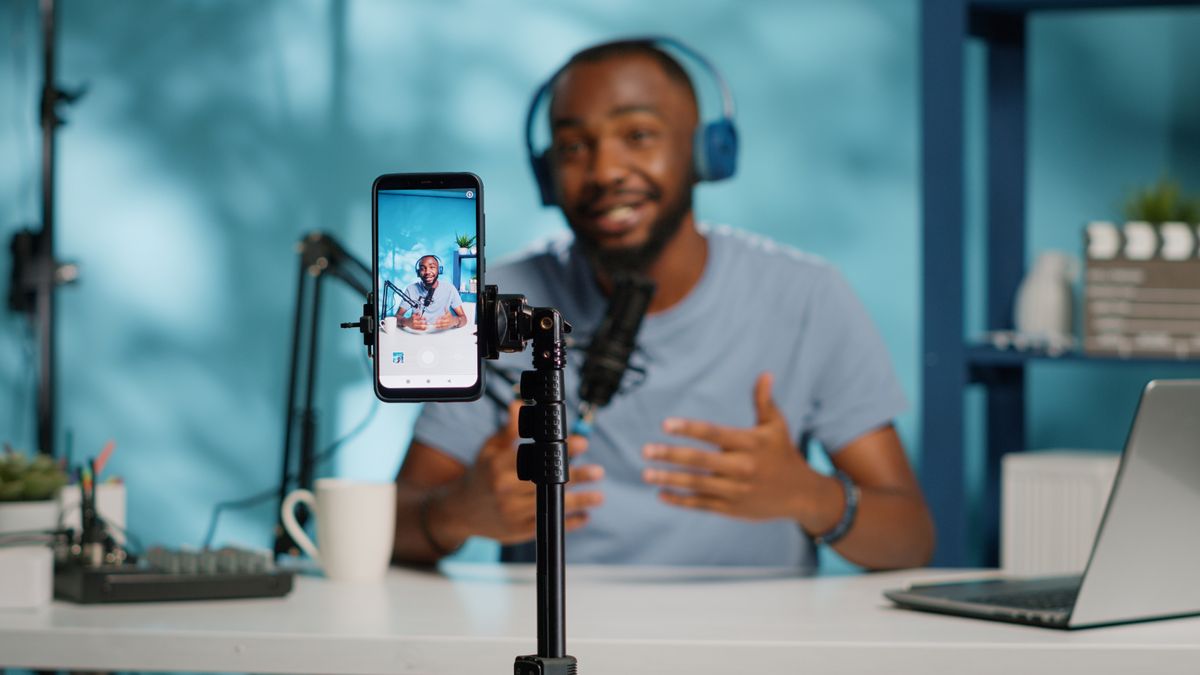 Content creator using one of the best content creator kits to record for podcast channel on social media