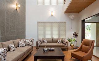 double height seating area at The Manjeri Residence