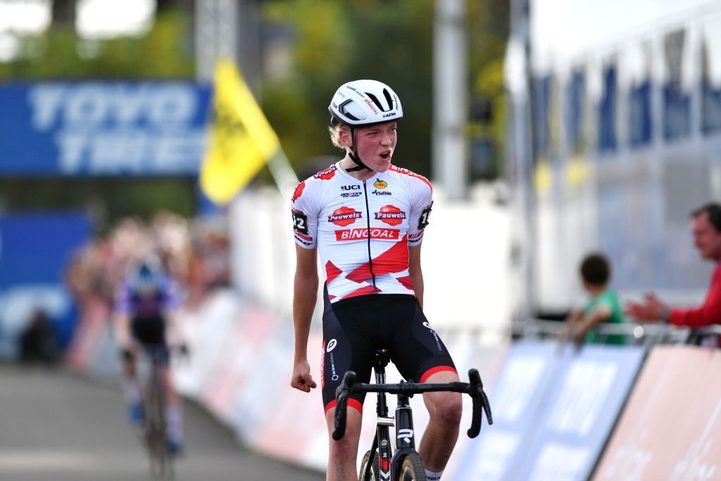 MAASMECHELEN BELGIUM OCTOBER 30 Fem Van Empel of The Netherlands and Team Pauwels Sauzen Bingoal celebrates at finish line as race winner during the 1st UCI Cyclocross World Cup Maasmechelen Womens Elite CXWorldCup on October 30 2022 in Maasmechelen Belgium Photo by Luc ClaessenGetty Images
