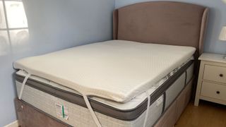 The Helix GlacioTex Premium Mattress Topper on a bed