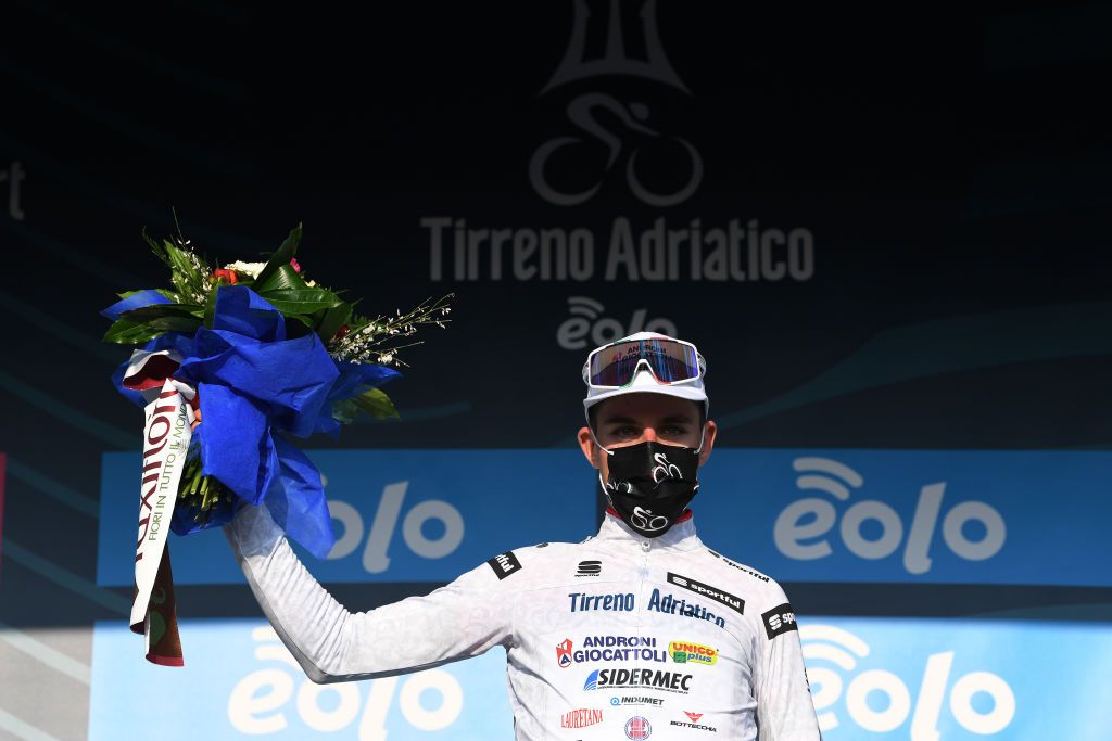 LIDO DI CAMAIORE ITALY MARCH 10 Podium Mattia Bais of Italy and Team Androni Giocattoli Sidermec White Best Young Rider Jersey Celebration during the 56th TirrenoAdriatico 2021 Stage 1 a 156km stage from Lido di Camaiore to Lido di Camaiore Mask Covid Safety Measures TirrenoAdriatico on March 10 2021 in Lido di Camaiore Italy Photo by Tim de WaeleGetty Images