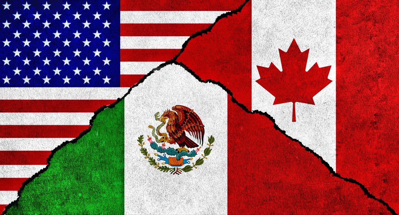 Flags of United States of America, Mexico and Canada represented on a wall.