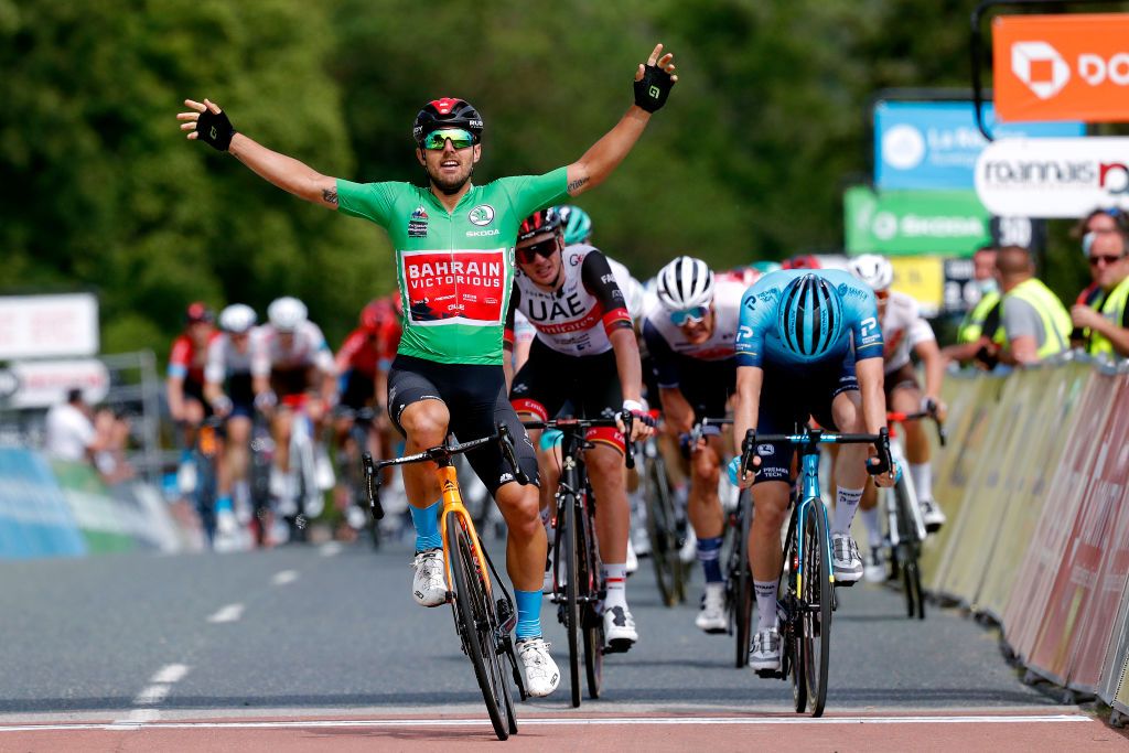 SAINT HAON LE VIEUXON FRANCE JUNE 01 Sonny Colbrelli of Italy and Team Bahrain Victorious Green Points Jersey stage winner celebrates at arrival Alex Aranburu Deba of Spain and Team Astana Premier Tech Josef Cerny of Czech Republic and Team Deceuninck QuickStep during the 73rd Critrium du Dauphin 2021 Stage 3 a 1722km stage from Langeac to Saint Haon Le Vieuxon UCIworldtour Dauphin dauphine June 01 2021 in Saint Haon Le Vieuxon France Photo by Bas CzerwinskiGetty Images