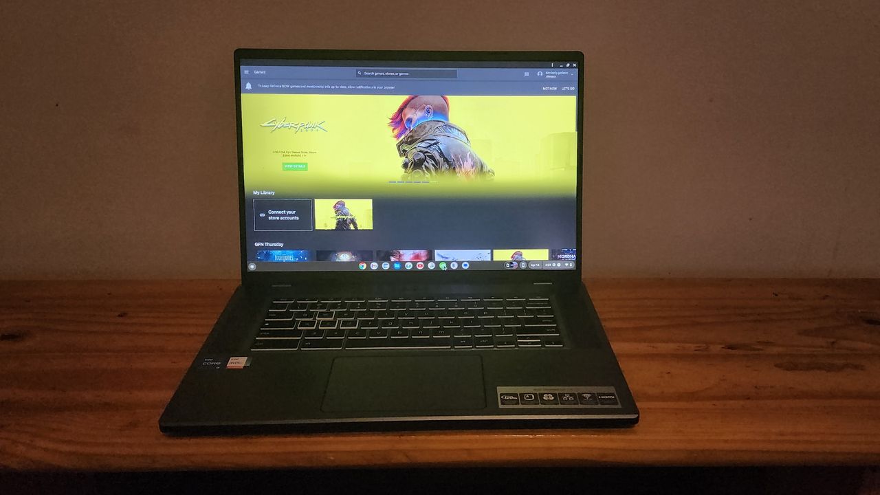 The Acer Chromebook 516 GE facing forward on a desk, showing the streaming page for Cyberpunk 2077.