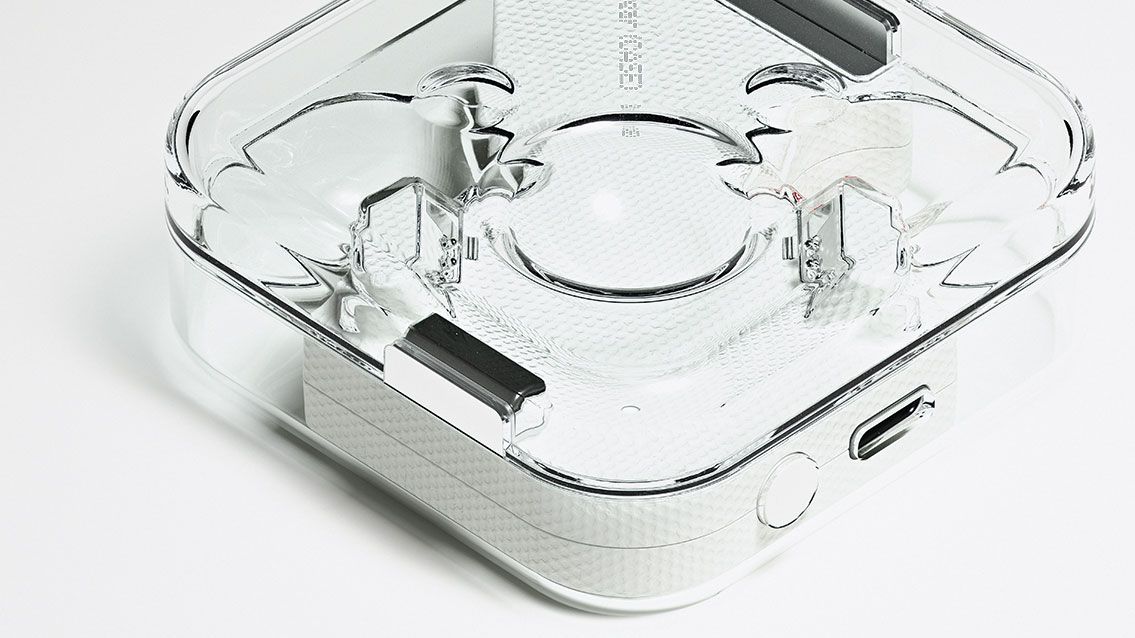 Close-up of the transparent Nothing Ear 1 case with the lid closed