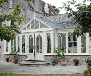 lean to conservatory with gothic arched entrance