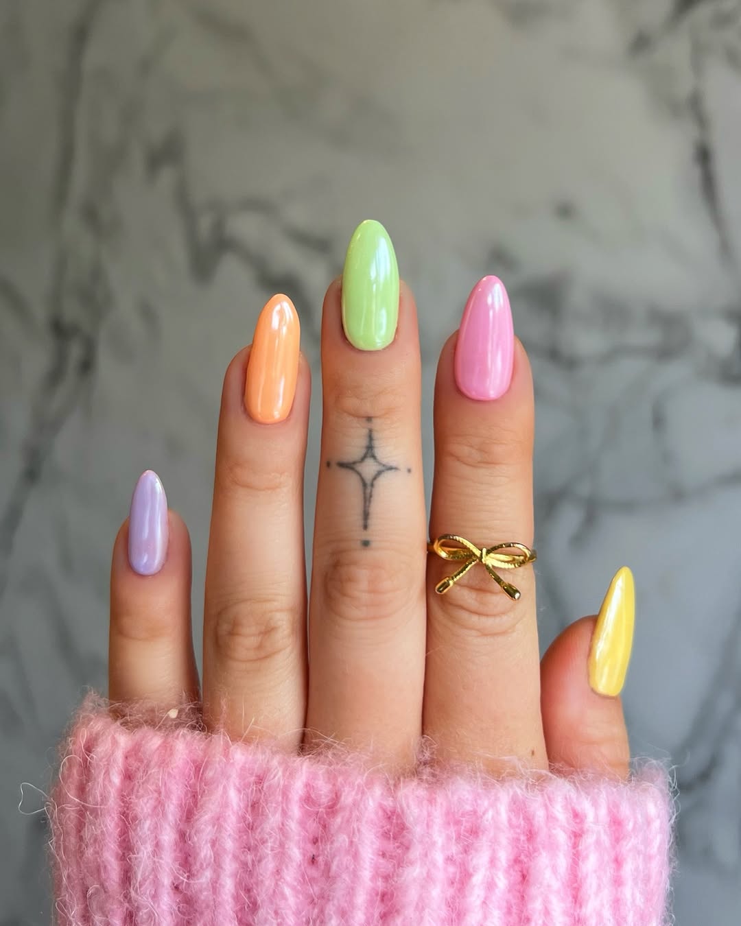 rainbow pastel manicure with chrome