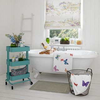 bathroom with white slats and floorboards