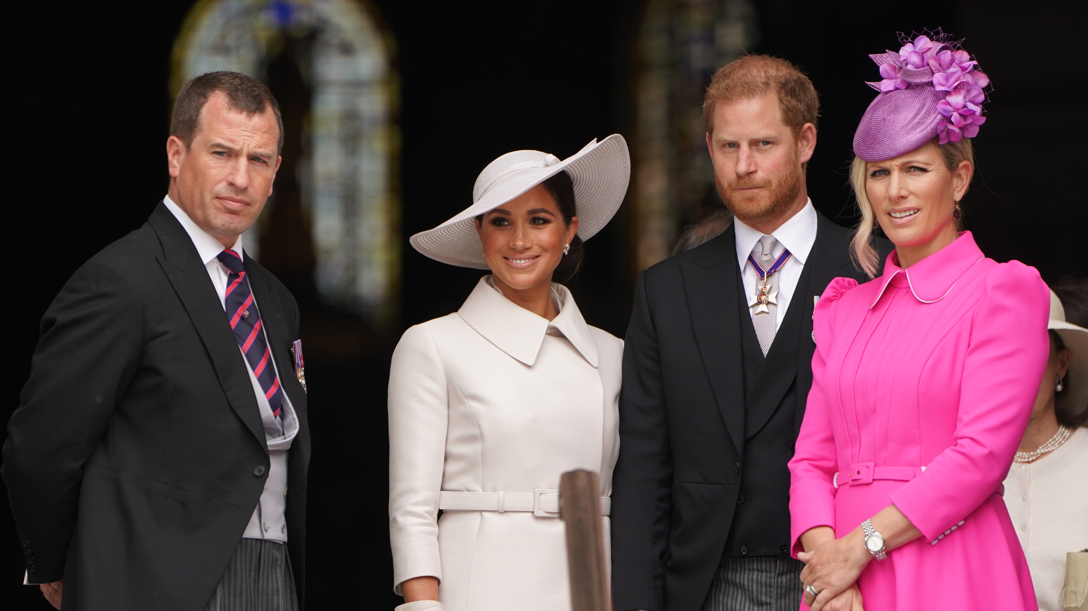 Peter Phillips, Meghan, Duchess of Sussex, Prince Harry, Duke of Sussex and Zara Tindall leave after the National Service of Thanksgiving to Celebrate the Platinum Jubilee