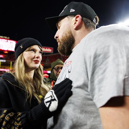 Taylor Swift celebrates with Travis Kelce after the AFC Championship Game at GEHA Field at Arrowhead Stadium on January 26, 2025 in Kansas City, Missouri