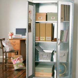 cupboard with boxes and filing cabinet