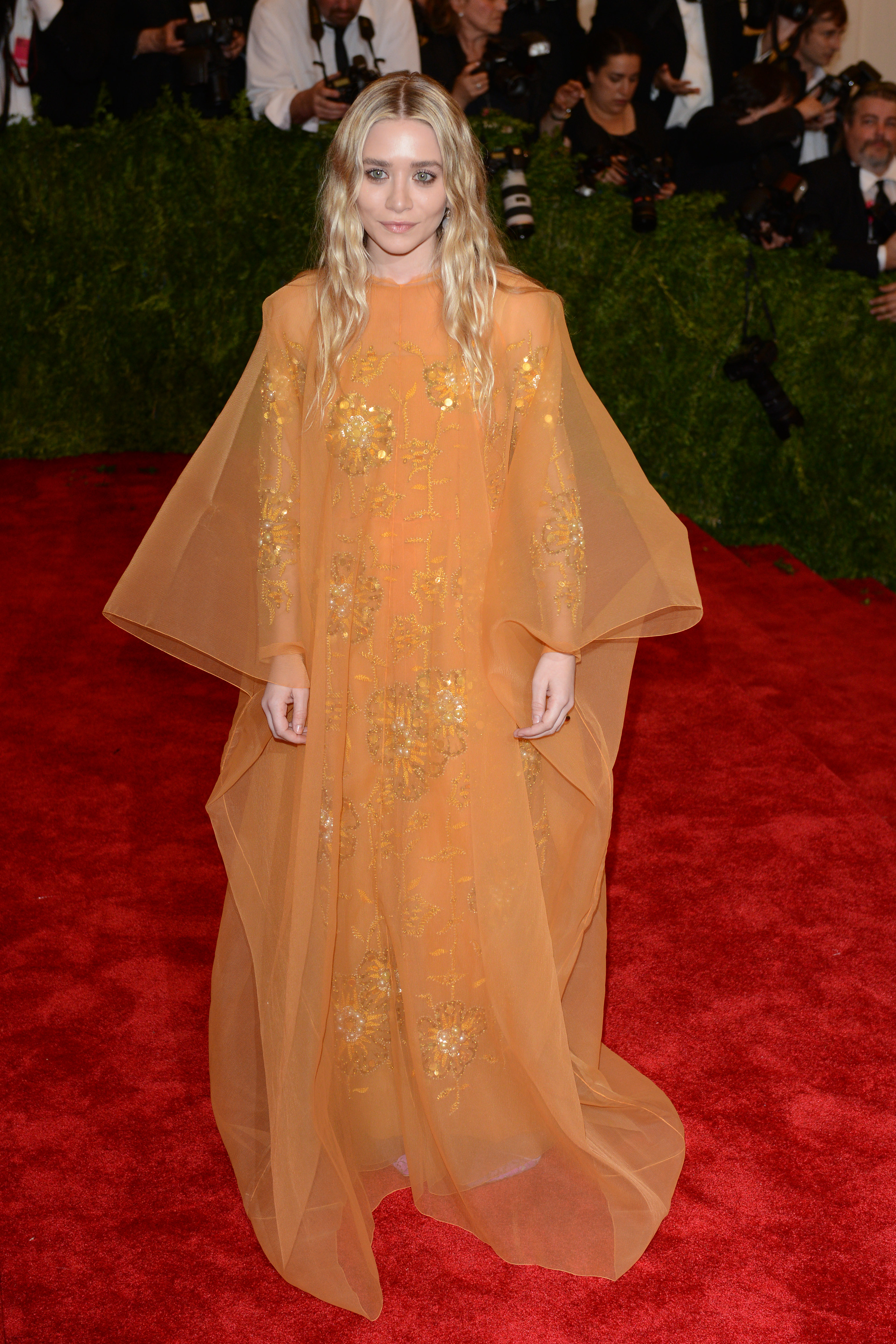 Images of celebrities at the Met Gala in the 2010s.