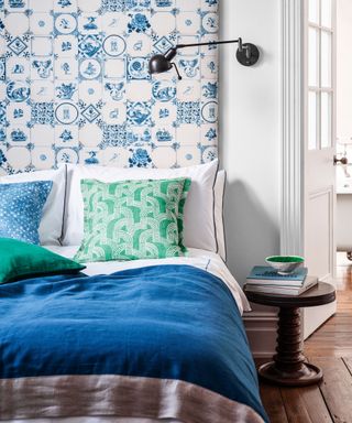 bedroom with blue and white bedding