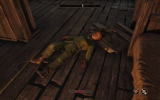 The Adoring Fan lies dead on the floor of a ruined ship