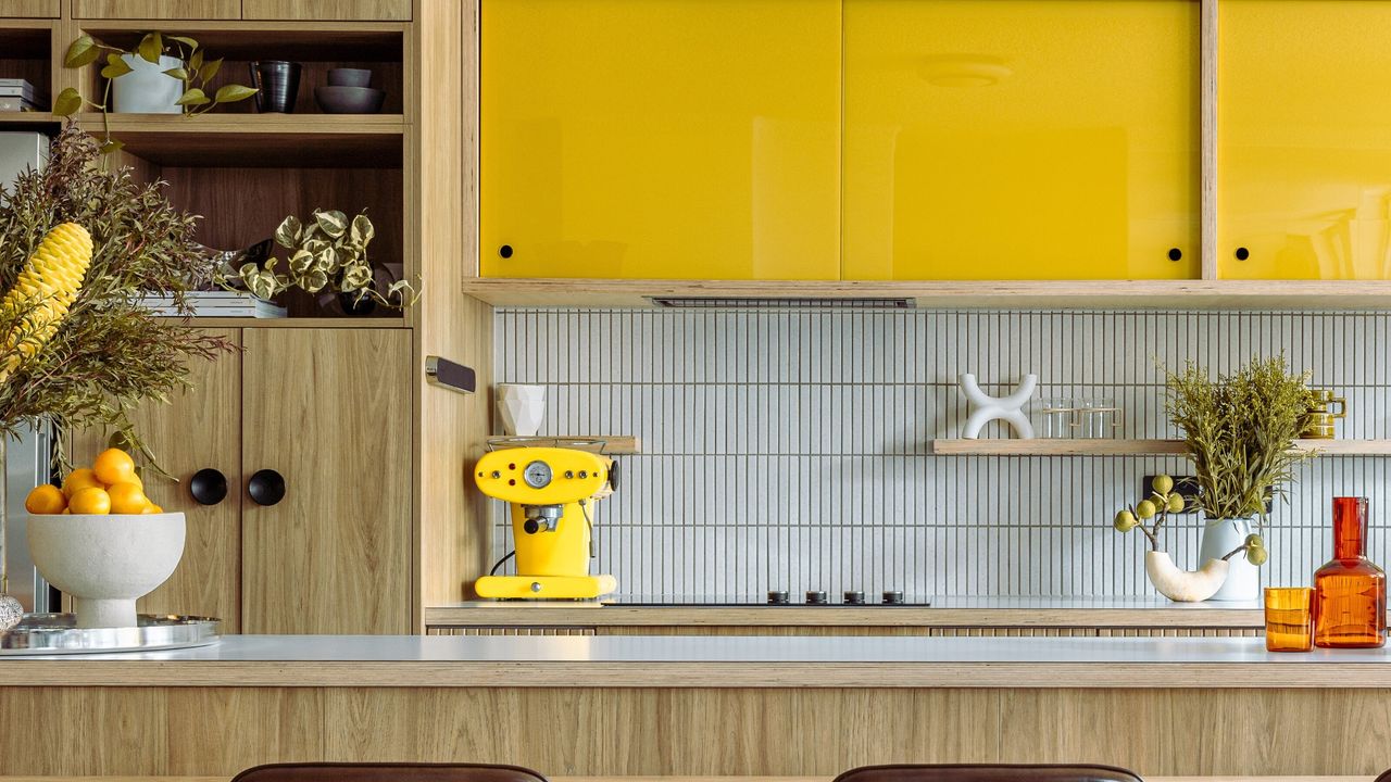 A kitchen with tile backsplash