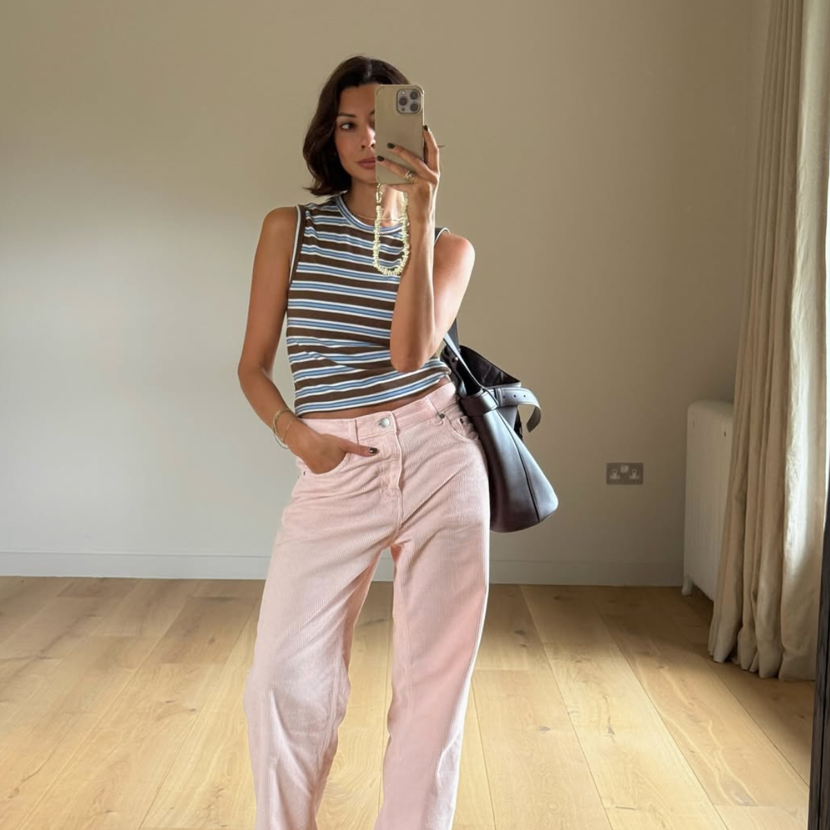 Marianne in pink jeans and striped top