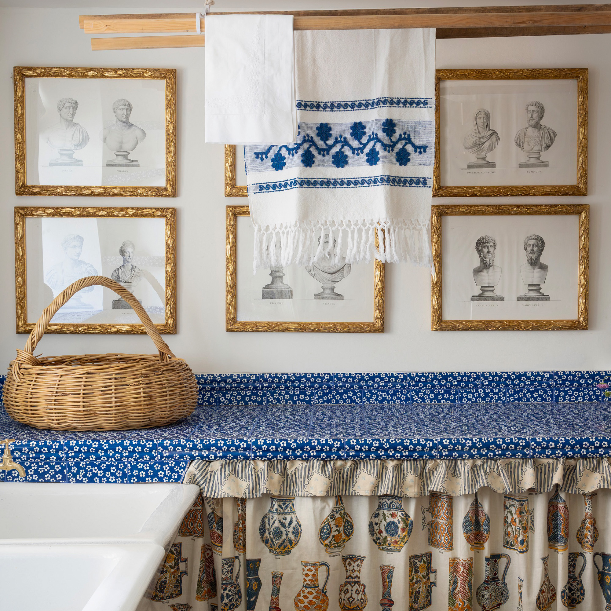 petra palumbo ditsy blue tiled worktop in utility with cabinet skirt and hanging airer