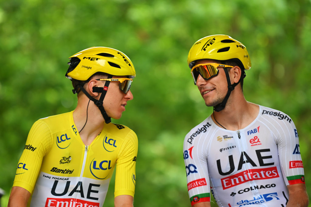 2024 Tour de France: Tadej Pogačar (l) talks to João Almeida
