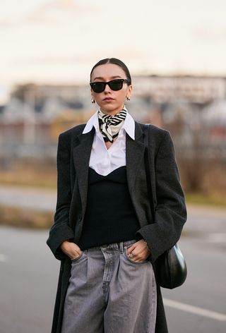 a photo showing how to style a designer scarf