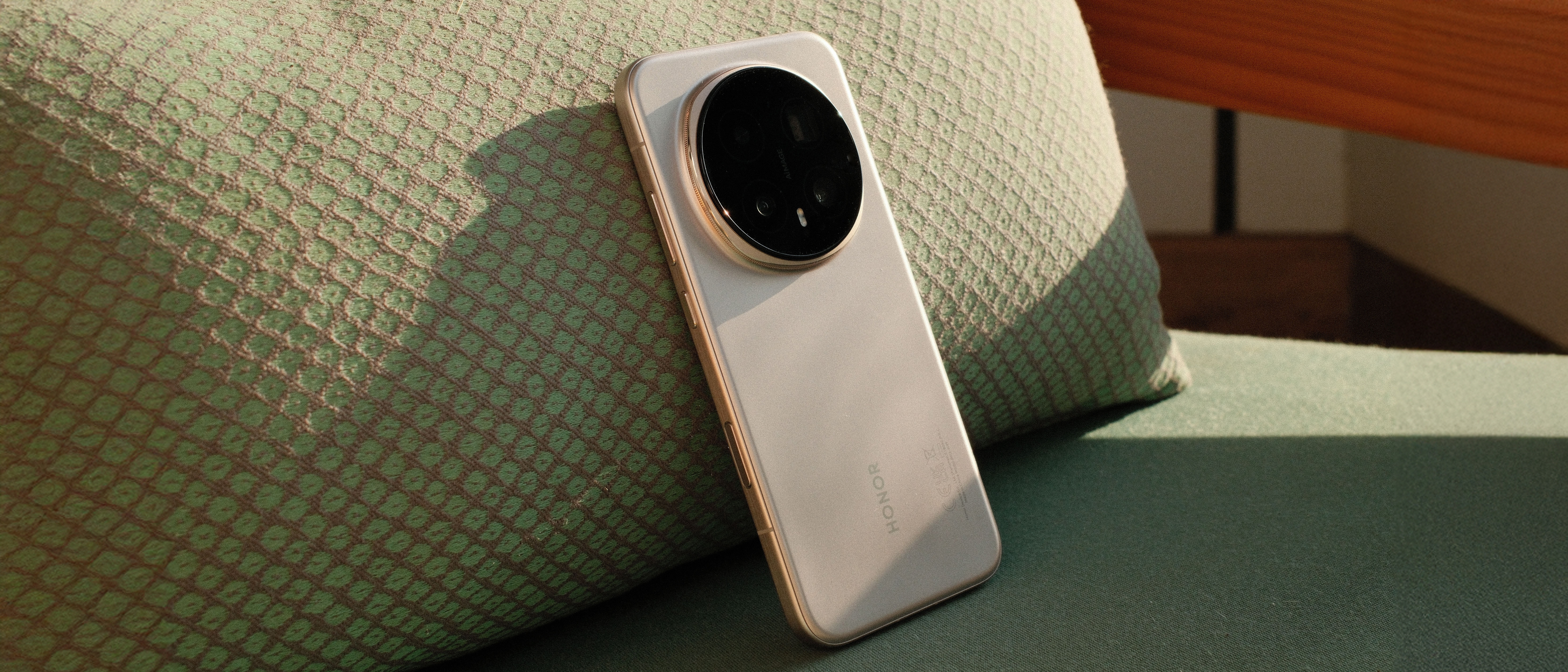 Honor Magic 8 Pro smartphone on a chair in the sun