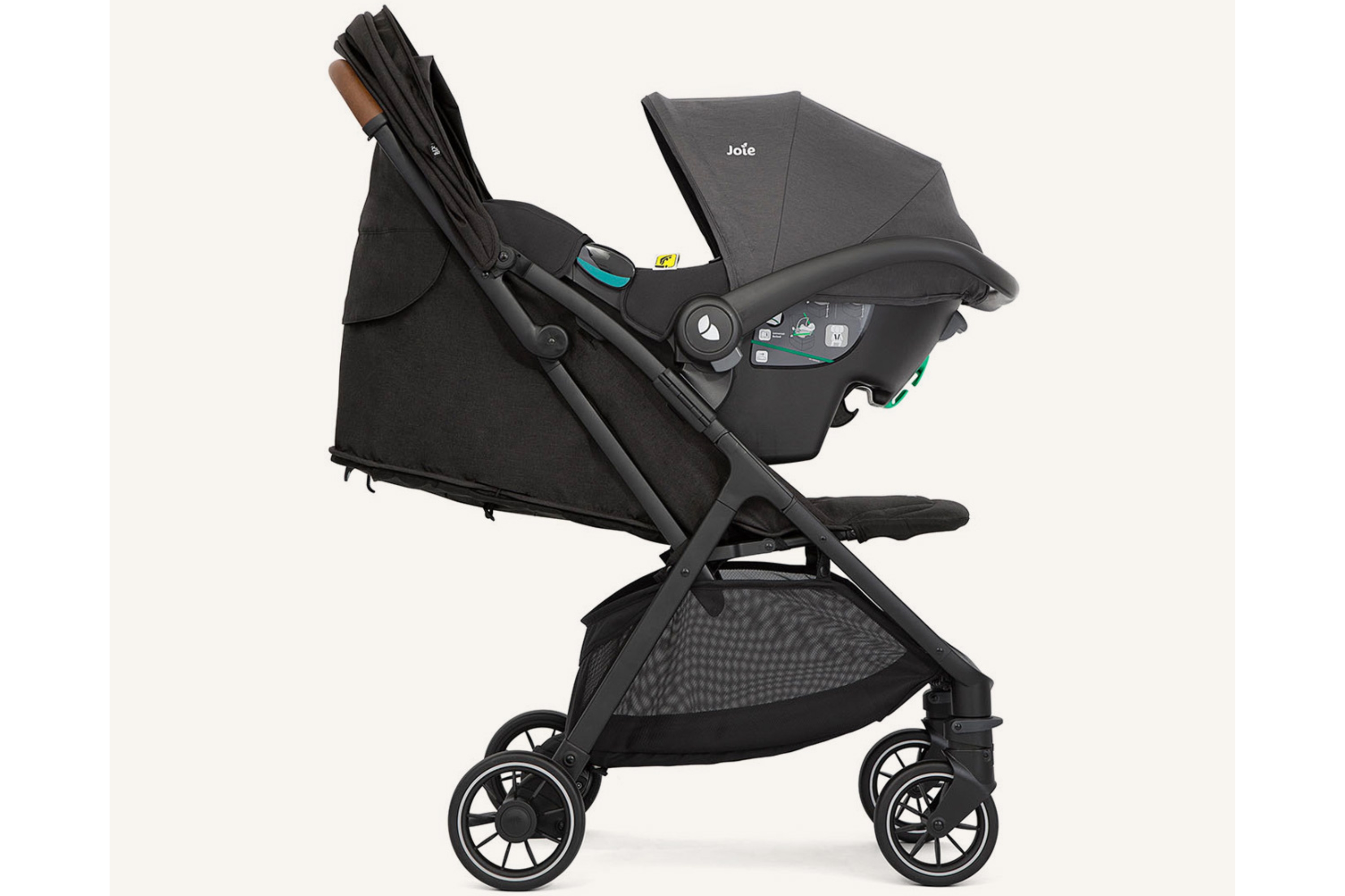 The Joie Pact Pro lightweight compact stroller with car seat attached