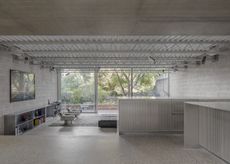 living space at Reciprical House by GianniBotsfordArchitects