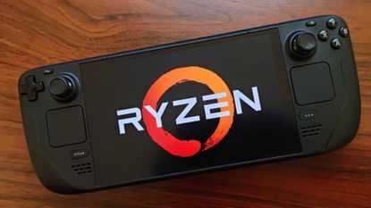 Steam Deck OLED with Ryzen logo on screen sitting on woodgrain desk