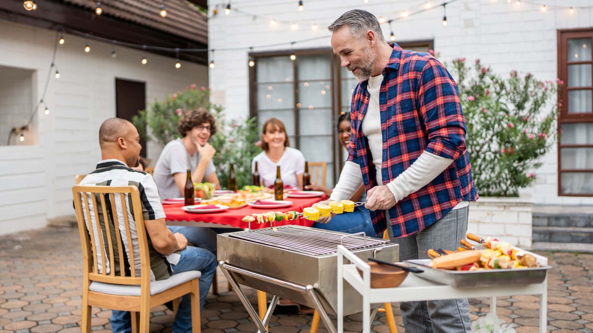 A group of friends enjoying a backyard BBQ